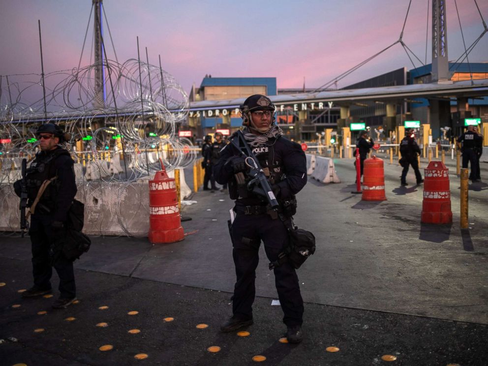   PHOTO: US Customs and Border Protection Special Action Team Officers Stand guard at San Ysidro Port of Entry after Temporary Closure of Post -French border to traffic from Tijuana (Mexico), November 19, 2018. 