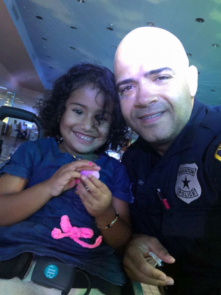 PHOTO: Officer Sandy Fernandez and Saoria have remained in touch since the dance and even had plans for a dinner date.