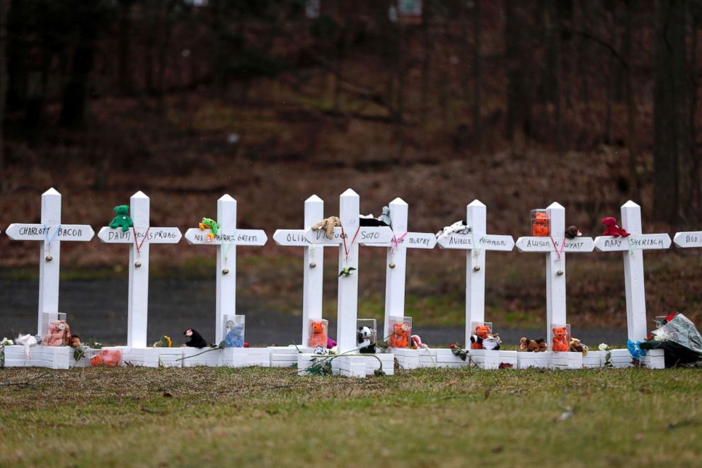 PHOTO: Crosses bearing the names of the Newtown shooting victims are displayed in the Sandy Hook village of Newtown, Conn., Dec. 22, 2012.