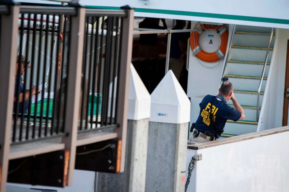 PHOTO: FBI investigators climb aboard the Vision, a sister vessel to the scuba boat Conception, to document its layout and learn more about the deadly pre-dawn fire in Santa Barbara, Calif., Sept. 3, 2019.