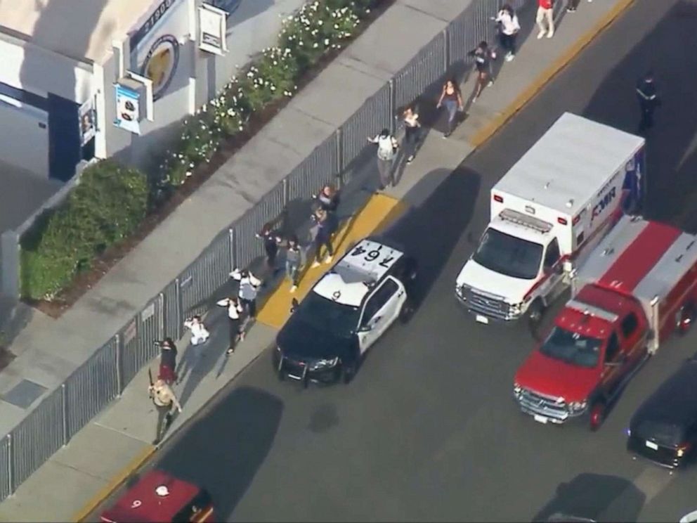 PHOTO: Students are evacuated from Saugus High School in Santa Clarita, Calif., near Los Angeles after reports of a shooting, Nov. 14, 2019.