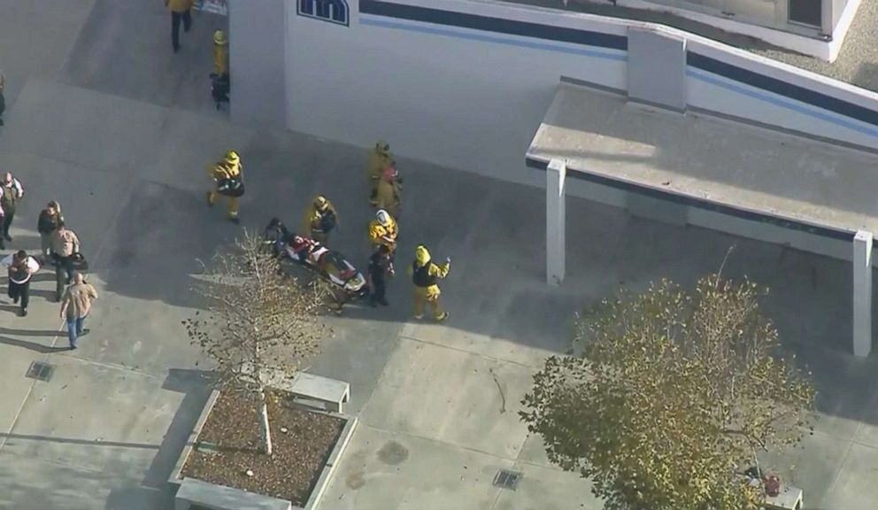 PHOTO: A person is carried by stretcher from Saugus High School in Santa Clarita, Calif., near Los Angeles, after reports of a shooting, Nov. 14, 2019.