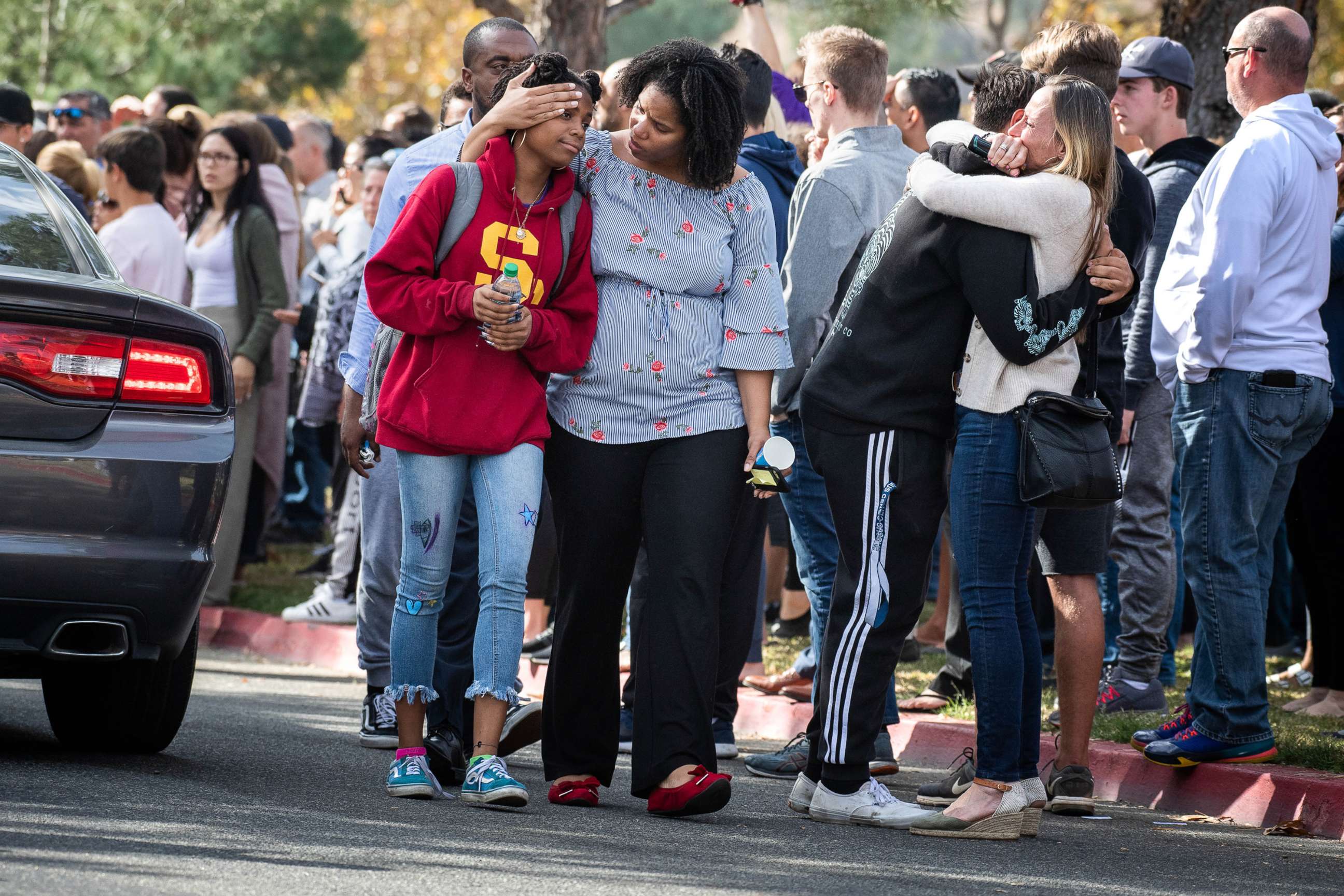 PHOTO: Saugus High School students reunite with their families after a mass shooting at their Santa Clarita High School that left two dead, Nov. 14, 2019.