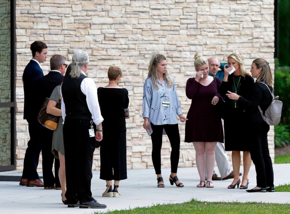 PHOTO: Mourners leave from the Bay Area Christian Church on May 25, 2018, in League City, Texas, after the funeral for Cynthia Tisdale, a substitute teacher who was killed during the mass shooting at Santa Fe High School.