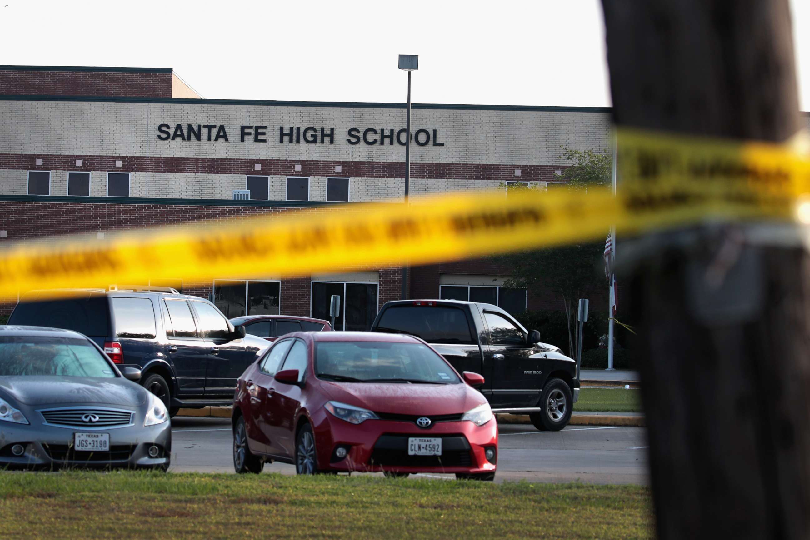 PHOTO: Crime scene tape is stretched across the front of Santa Fe High School on May 19, 2018 in Santa Fe, Texas.