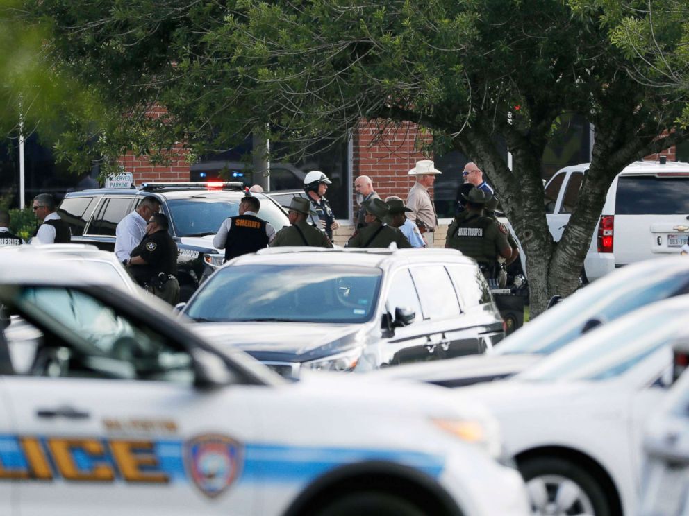 PHOTO: Emergency responders from multiple agencies work at the scene in front of Santa Fe High School in response to a shooting, May 18, 2018, in Santa Fe, Texas.