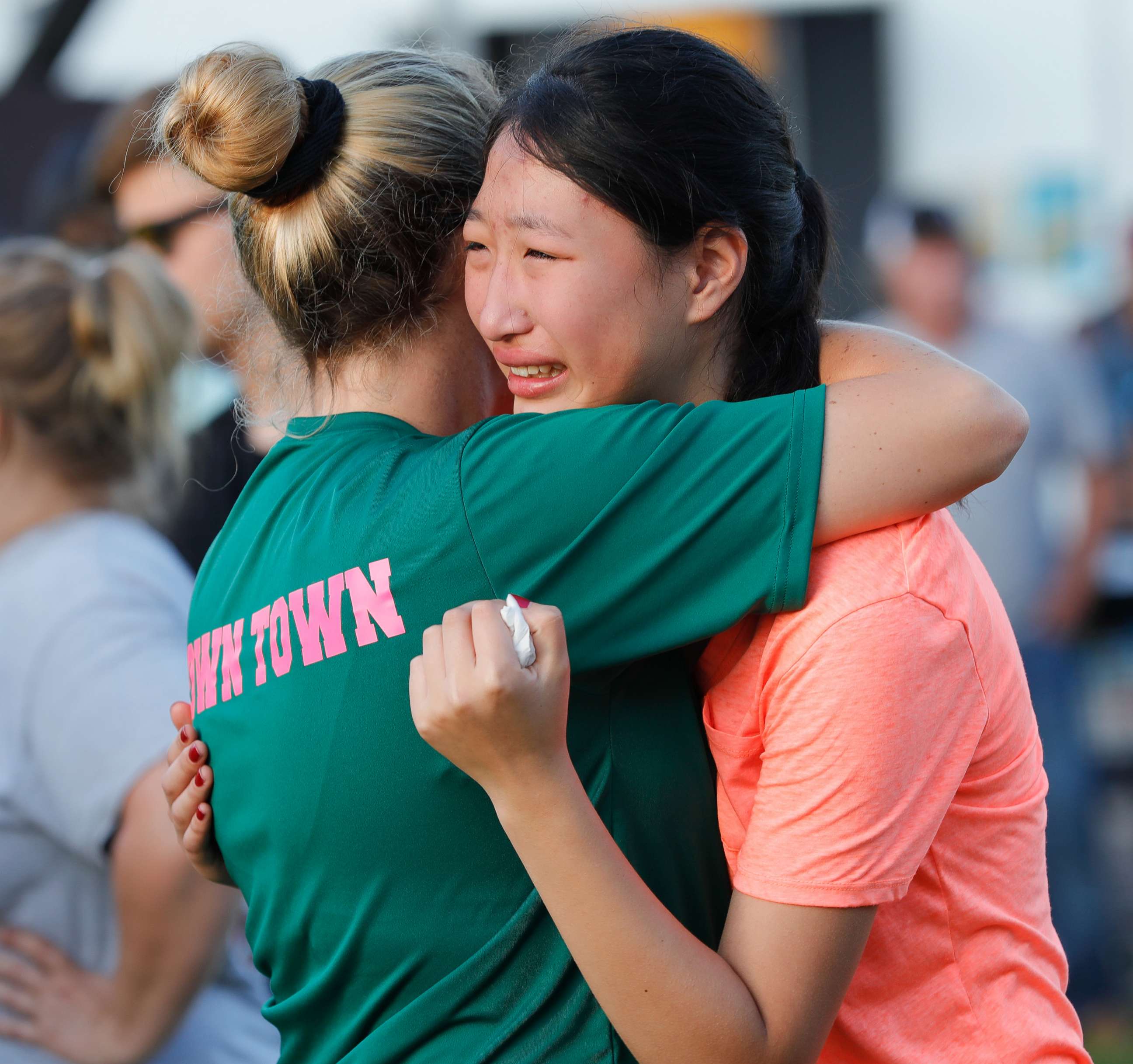 PHOTO: Friends and family attend a vigil held at the First Bank in Santa Fe for the victims of a shooting incident at Santa Fe High School, May 18, 2018 in Santa Fe, Texas.