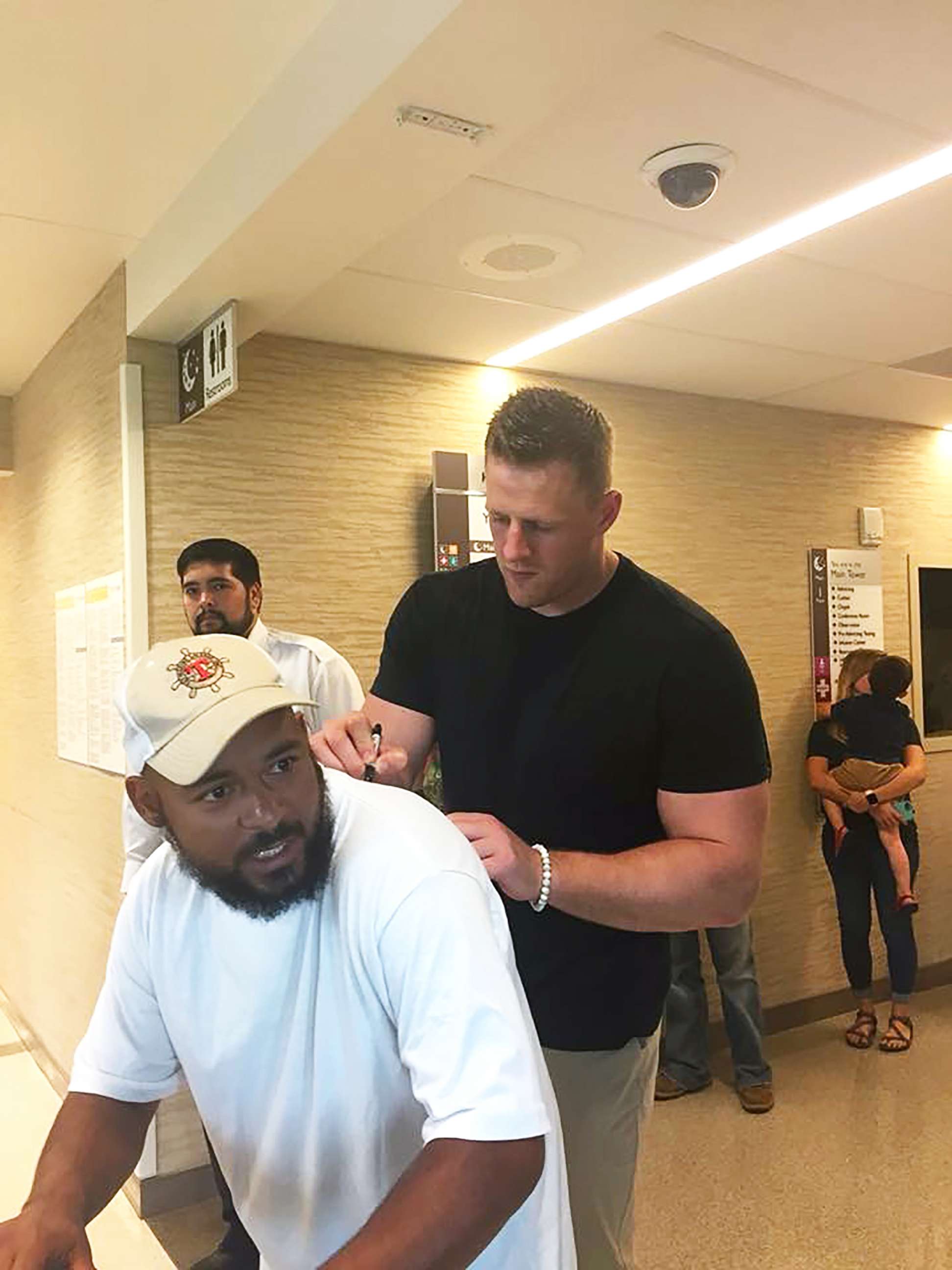PHOTO: Houston Texans' star J.J. Watt visited with survivors of the Santa Fe High School shooting at Clear Lake Regional Medical Center on May 22, 2018, and stopped to take photos with nurses who have been working to care for the wounded.