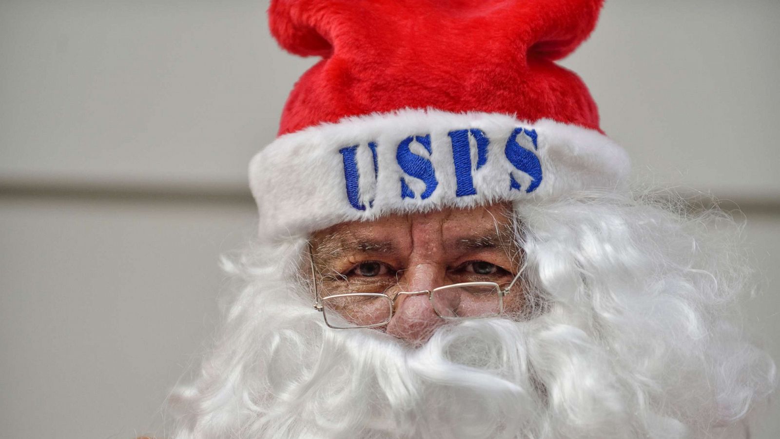 PHOTO: In this Dec. 5, 2017, file photo, Santa Claus greets visitors during Operation Santa at the post office in Los Angeles.