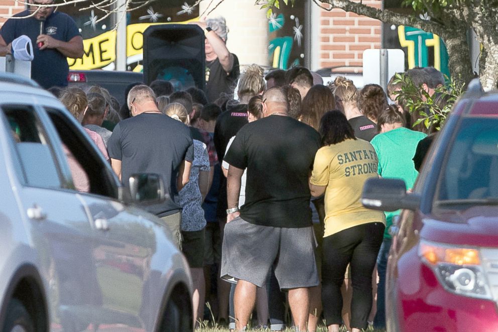 PHOTO: The community of Sante Fe gathers outside the Santa Fe High School for a vigil before the first day of school, Aug. 19, 2018, in Sante Fe Texas.