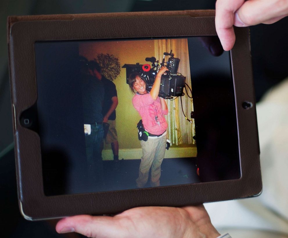 PHOTO: Elizabeth and Richard Jones flip through photos of their daughter Sarah Jones, a camera assistant killed by a freight train while filming "Midnight Rider," in southeast Georgia, as they sit in their attorney's office, in Atlanta, April 9, 2014.