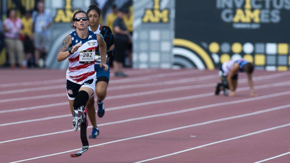 PHOTO: Sarah Rudder (L) of the U.S. leads Sabrina Daulaus of France as Christy Wise (R-rear) of the U.S. falls in the Women's IT1/IT2/IT3 200m Final during the Athletic events of the third Invictus Games in Toronto, Sept. 24, 2017. 