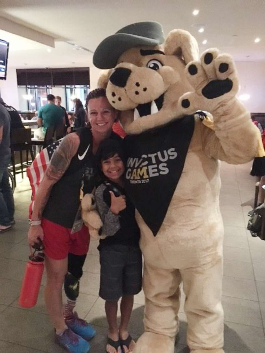 PHOTO: Invictus Games gold medal winner Sarah Rudder poses with her 9-year-old son, Xavier, at this year's games in Toronto.