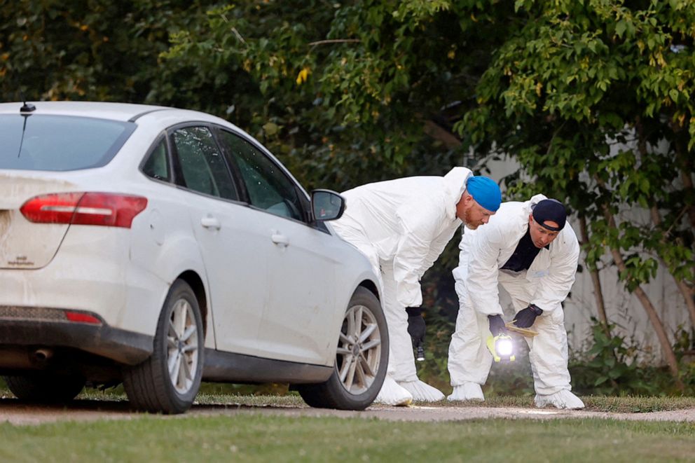 PHOTO: A police forensics team investigates a crime scene after multiple people were killed and injured in a stabbing spree in Weldon, Saskatchewan, Sept. 4, 2022.