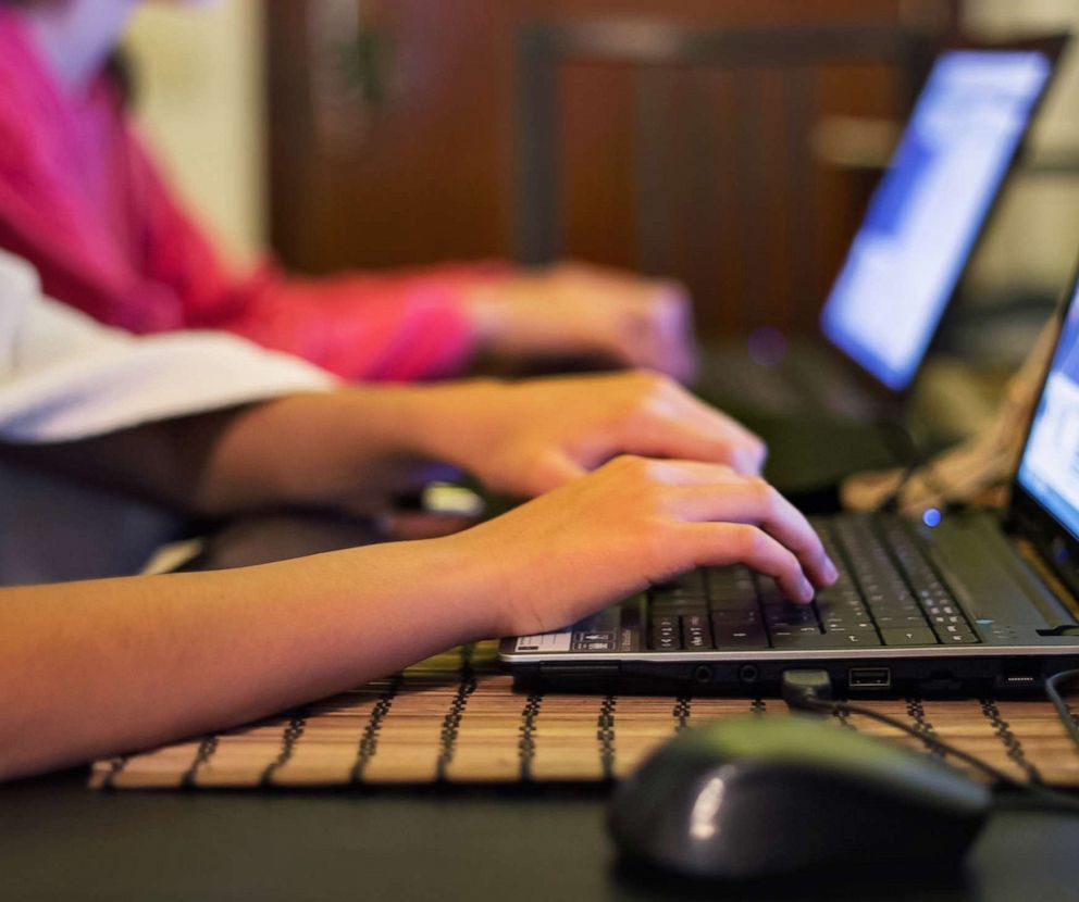 PHOTO:  Student use laptops.