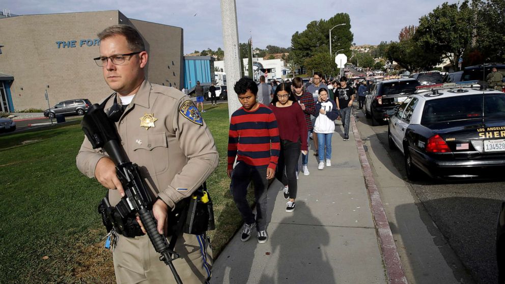 PHOTO: Students are escorted out of Saugus High School after reports of a shooting on  Nov. 14, 2019, in Santa Clarita, Calif.