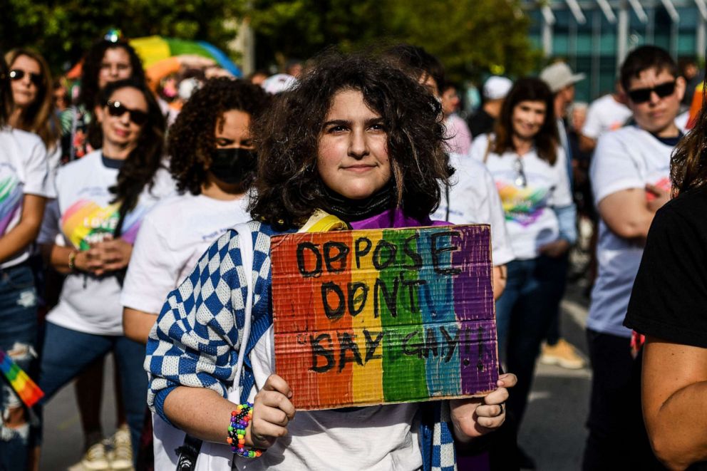 PHOTO: Members and supporters of the LGBTQ community attend the "Say Gay Anyway" rally in Miami, March 13, 2022. Florida's state senate passed a bill banning lessons on sexual orientation and gender identity in elementary schools.