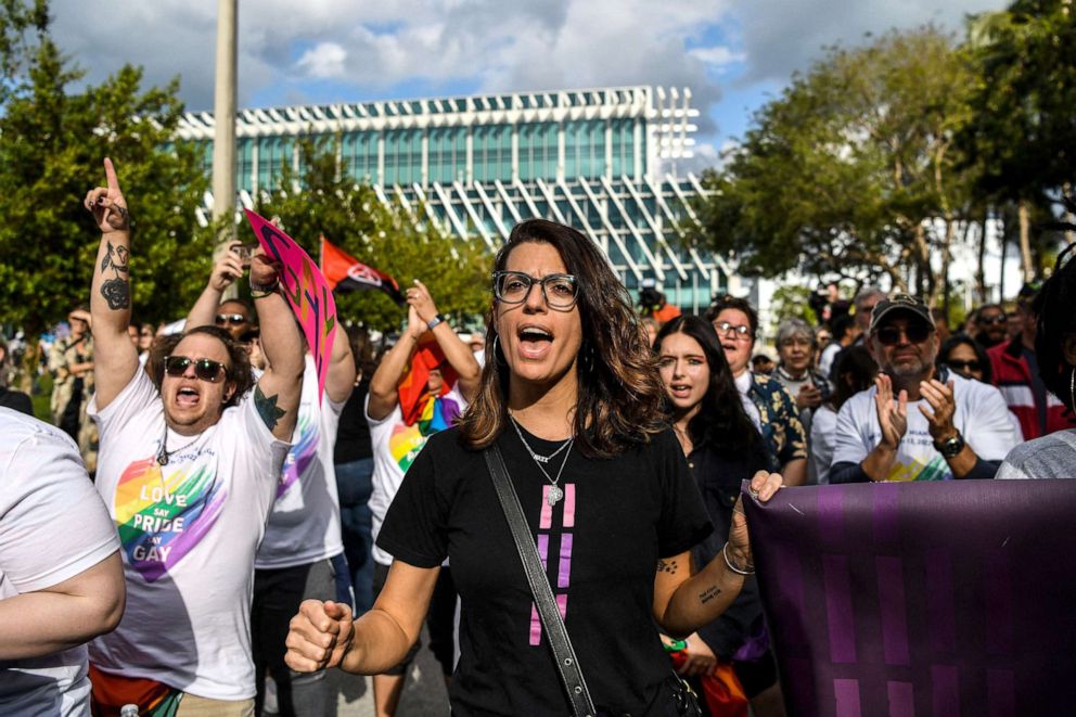 PHOTO:  Members and supporters of the LGBTQ community attend the "Say Gay Anyway" rally in Miami, March 13, 2022. Florida's state senate passed a bill banning lessons on sexual orientation and gender identity in elementary schools.