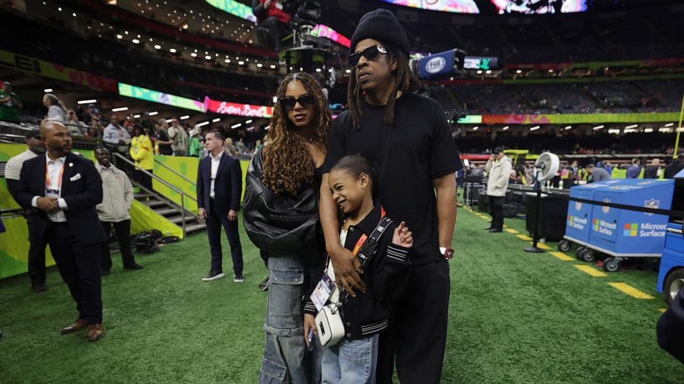 PHOTO: Recording artist Jay-Z with children Blue Ivy Carter and Rumi Carter before Super Bowl LIX between the Philadelphia Eagles and the Kansas City Chiefs in New Orleans, Feb. 9, 2025.