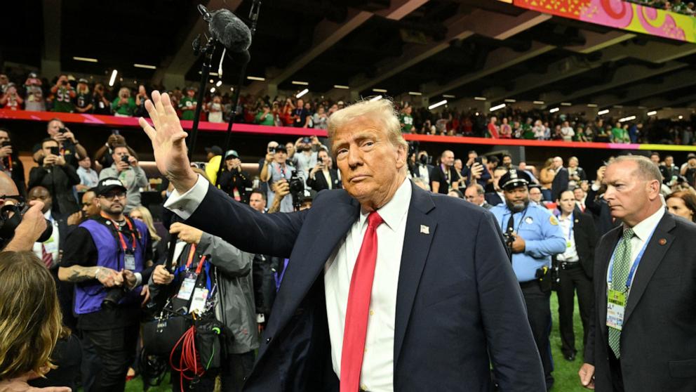 PHOTO: President Donald Trump visits the field before the start of Super Bowl LIX between the Kansas City Chiefs and the Philadelphia Eagles in New Orleans, Feb. 9, 2025. 