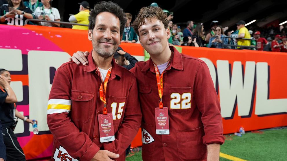 PHOTO: Paul Rudd, left, poses for a photo on the field before the start of Super Bowl LIX in New Orleans, Feb. 9, 2025.