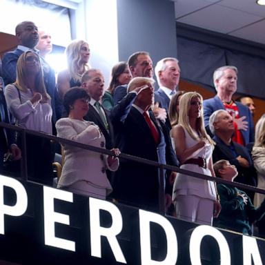 PHOTO: President Donald Trump salutes during the national anthem with Ivanka Trump and New Orleans Saints owner Gayle Benson before the start of Super Bowl LIX in New Orleans, Feb. 9, 2025.