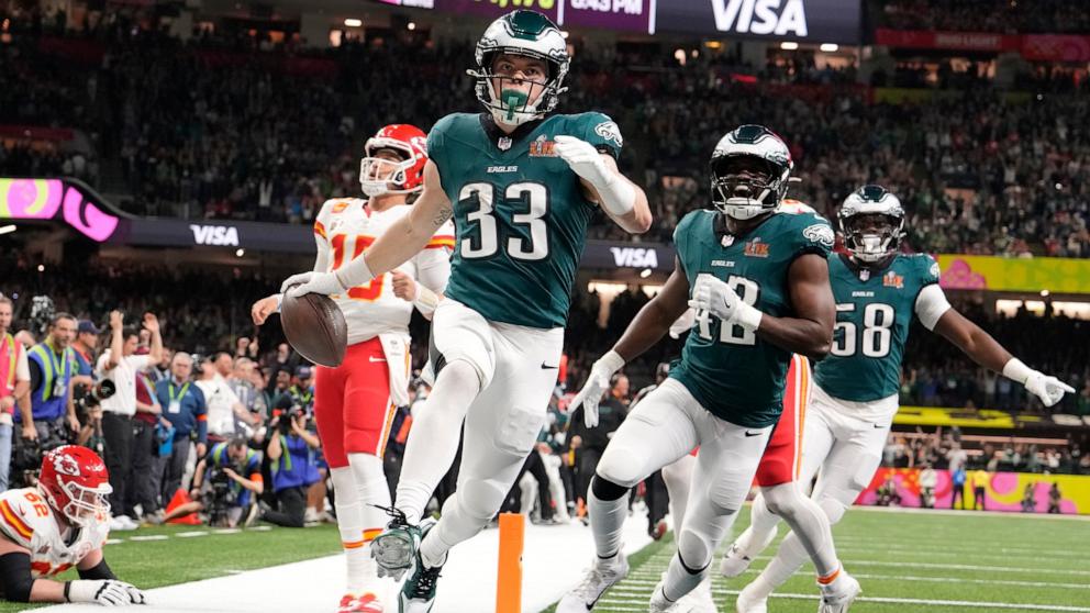 PHOTO: Cooper DeJean of the Philadelphia Eagles celebrates scoring a touchdown after intercepting a pass by Kansas City Chiefs quarterback Patrick Mahomes (L) during Super Bowl LIX, Feb. 9, 2025 in New Orleans.