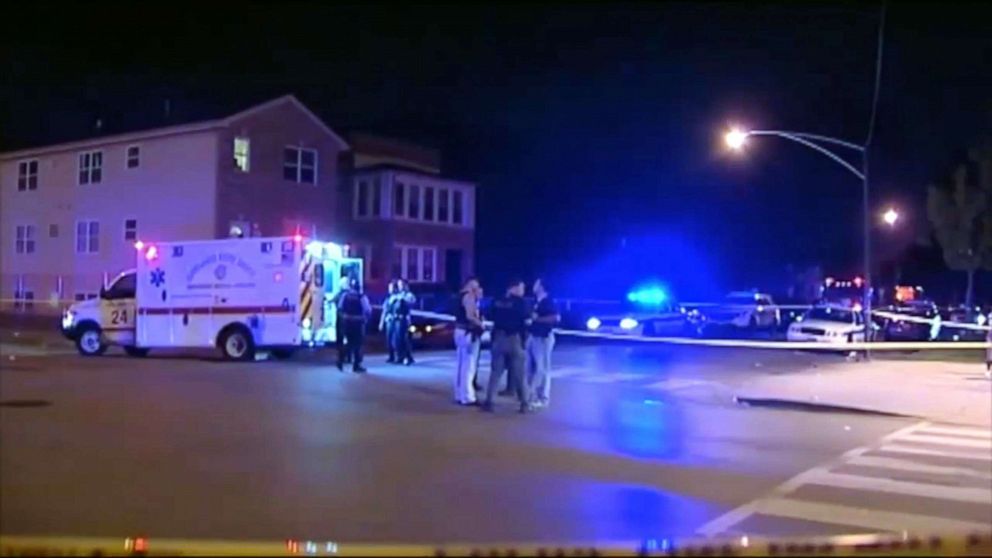 PHOTO: Police and EMT's on the scene where  two mothers, Chantell Grant and Andrea Stoudemire, were shot and killed in Chicago, July 26, 2019.