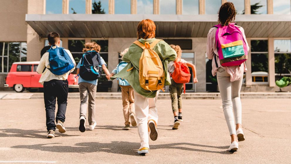 Photo: Students walking around a school in an un-dated stock photo.
