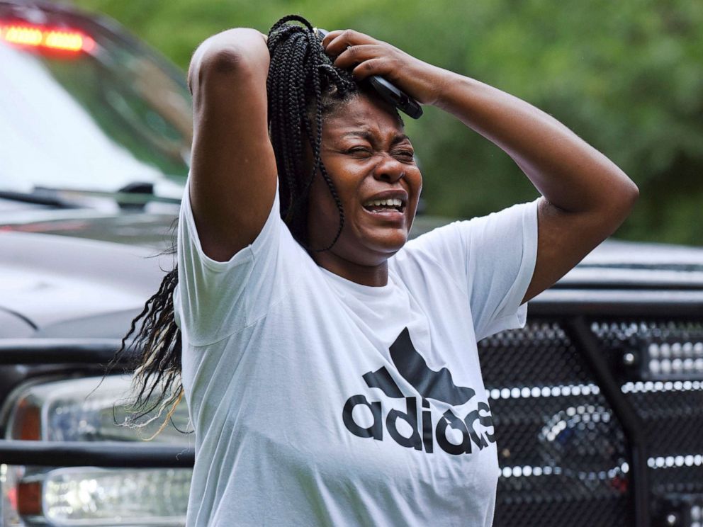 PHOTO: A woman screams as she arrives at Mount Tabor High School in Winston-Salem, N.C., 30 minutes after the call of shots fired at the school, Sept. 1, 2021.