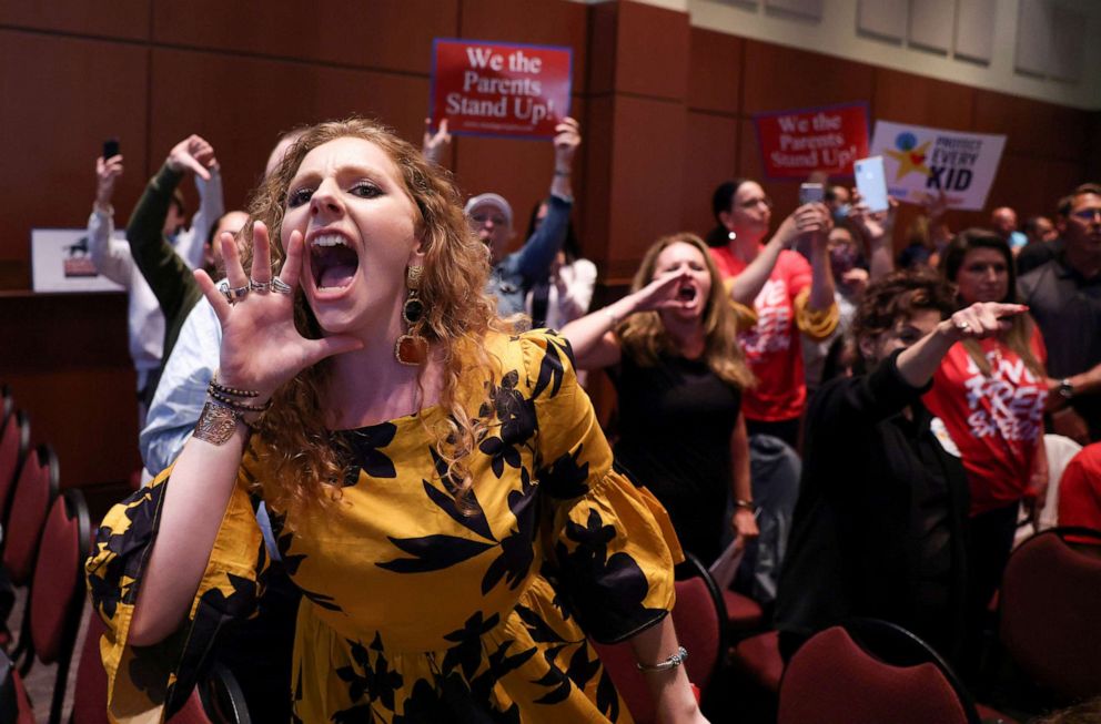 PHOTO: In this June 22, 2021, file photo, angry parents and community members protest after a Loudoun County School Board meeting was halted by the school board because the crowd refused to quiet down, in Ashburn, Va.