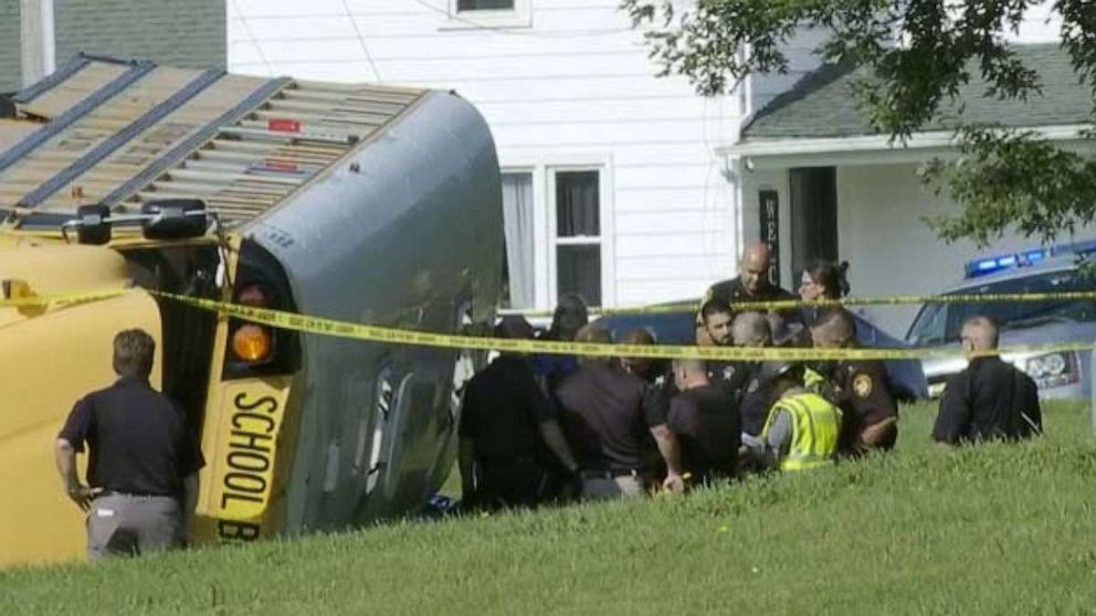 PHOTO: Law enforcement officials work at the scene of a school bus crash in Clark County, Ohio, on Aug. 22, 2023.