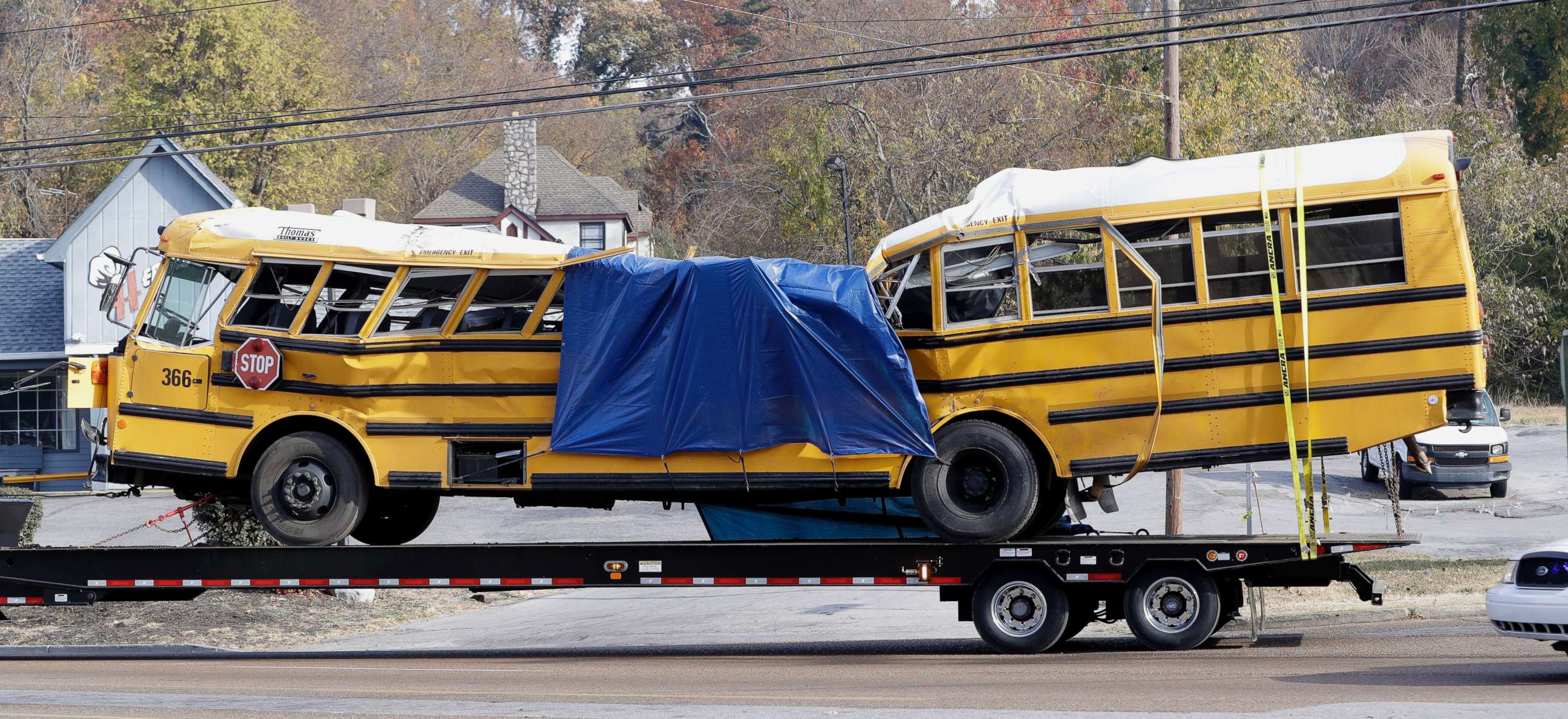 PHOTO: A school bus is carried away from the site of a fatal crash in Chattanooga, Tenn., Nov. 22, 2016.