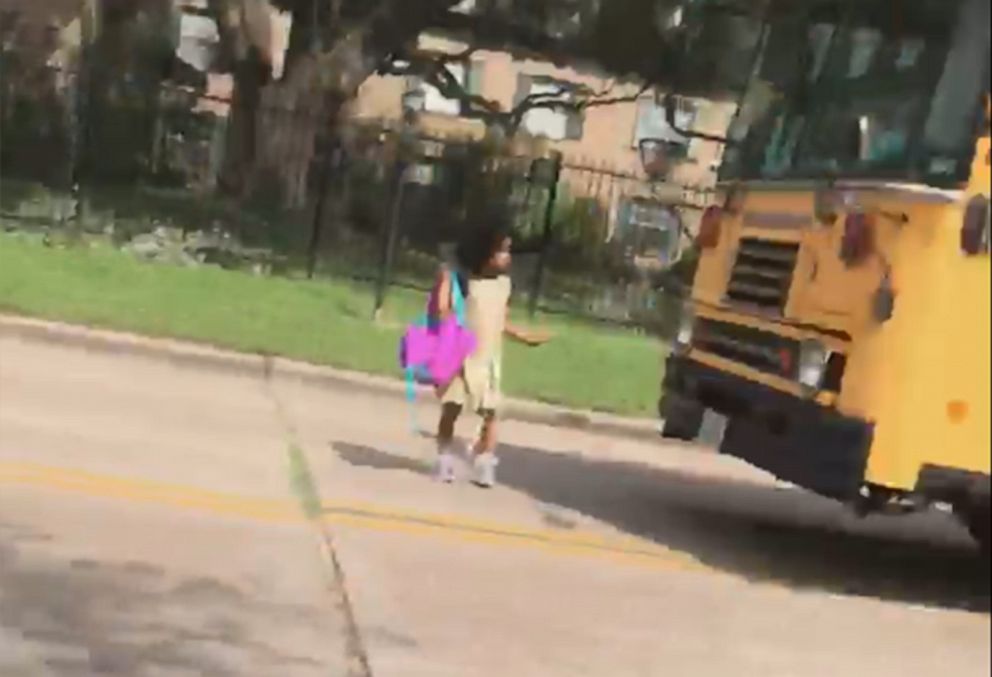 Driver arrested after nearly hitting girl getting off school bus, police say