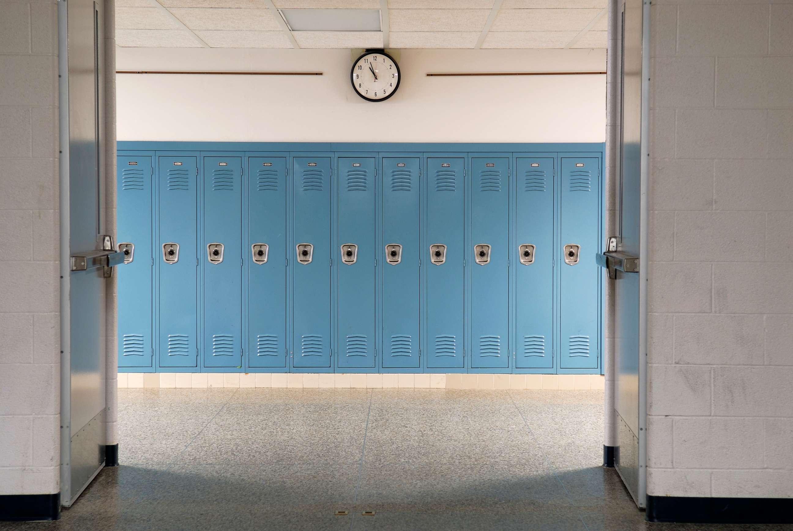 PHOTO: Empty school hallway.