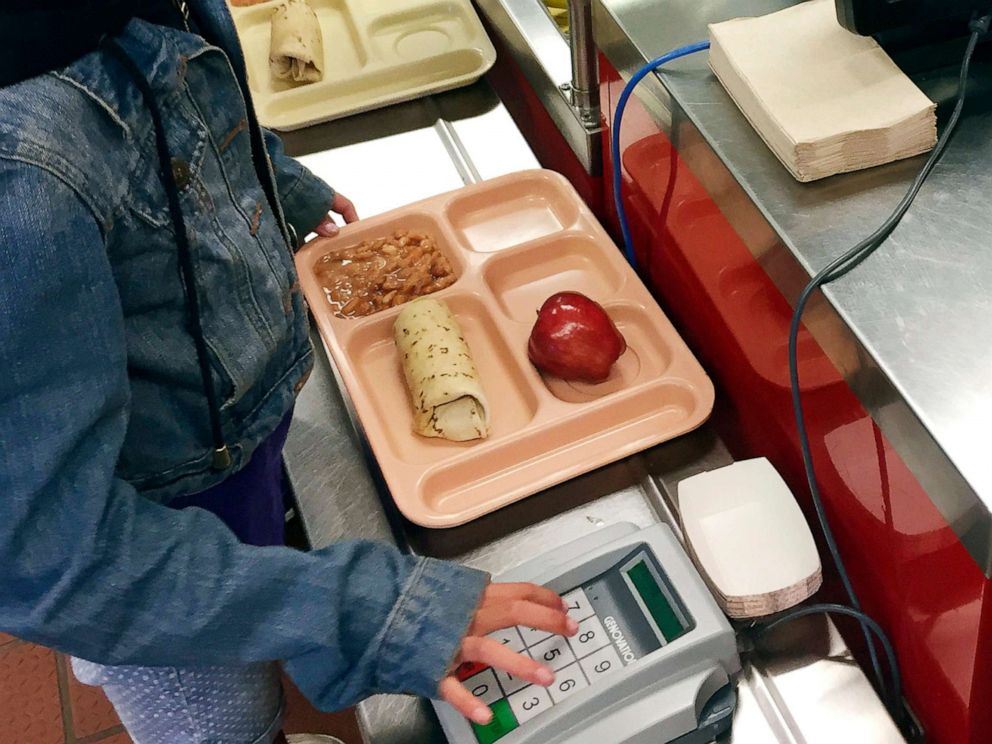 PHOTO: A third-grader punches in her student identification to pay for a meal at Gonzales Community School in Santa Fe, N.M., May 4, 2017.