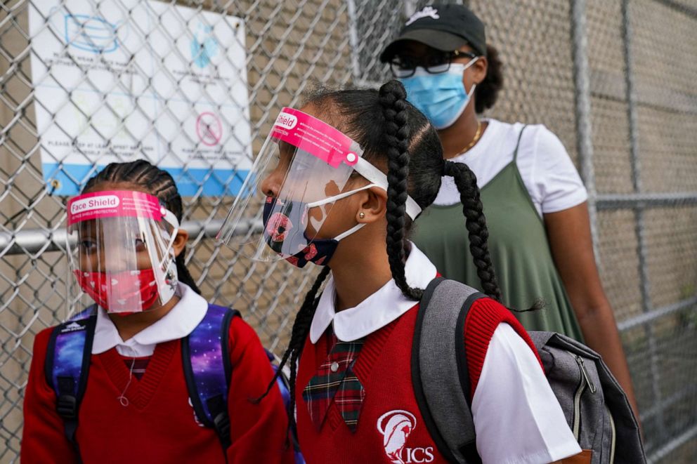 PHOTO: In this Sept. 9, 2020, file photo, students wear protective masks as they arrive for classes at the Immaculate Conception School while observing COVID-19 prevention protocols in The Bronx borough of New York.