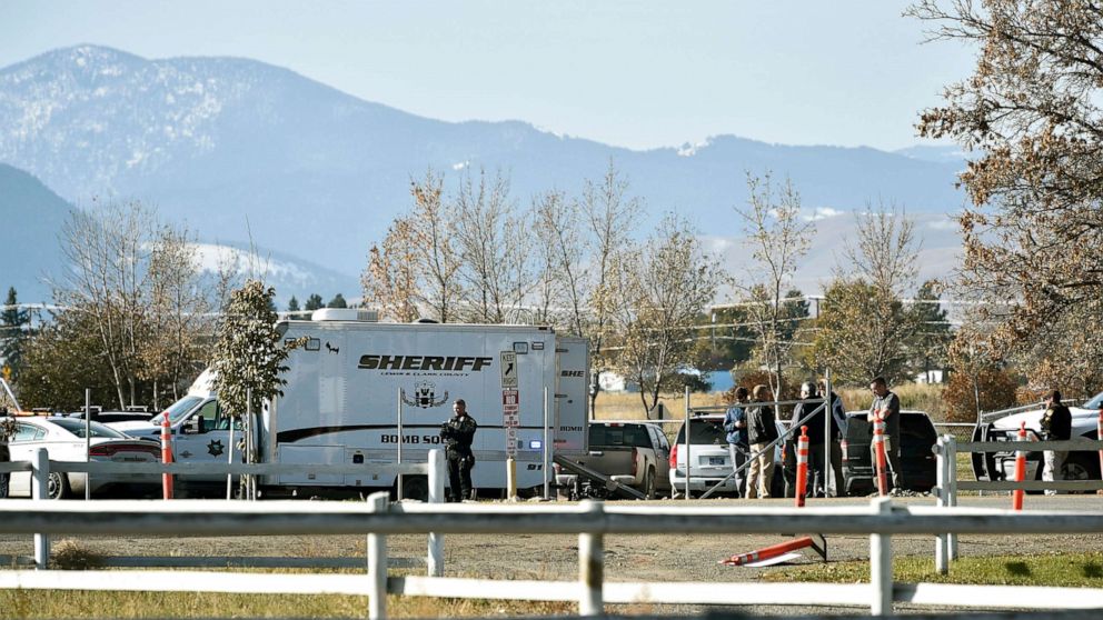 PHOTO: The Lewis and Clark County bomb squad works the scene at Rossiter Elementary school Oct. 15, 2019, after an improvised explosive device detonated on the school playground, in Helena, Mont.