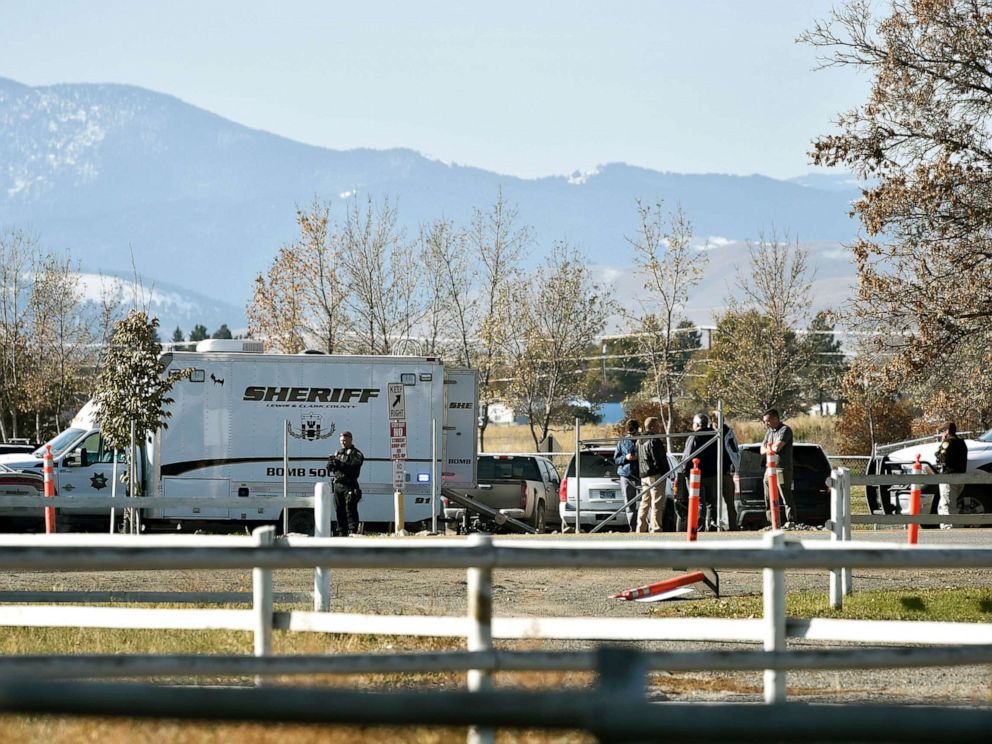 PHOTO: The Lewis and Clark County bomb squad works the scene at Rossiter Elementary school Oct. 15, 2019, after an improvised explosive device detonated on the school playground, in Helena, Mont.