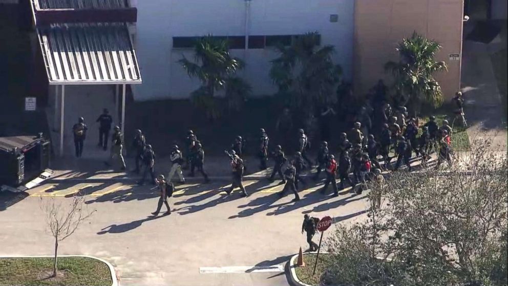 PHOTO: First responders enter Marjory Stoneman Douglas High School after a shooting in Parkland, Fla., Feb. 14, 2018.