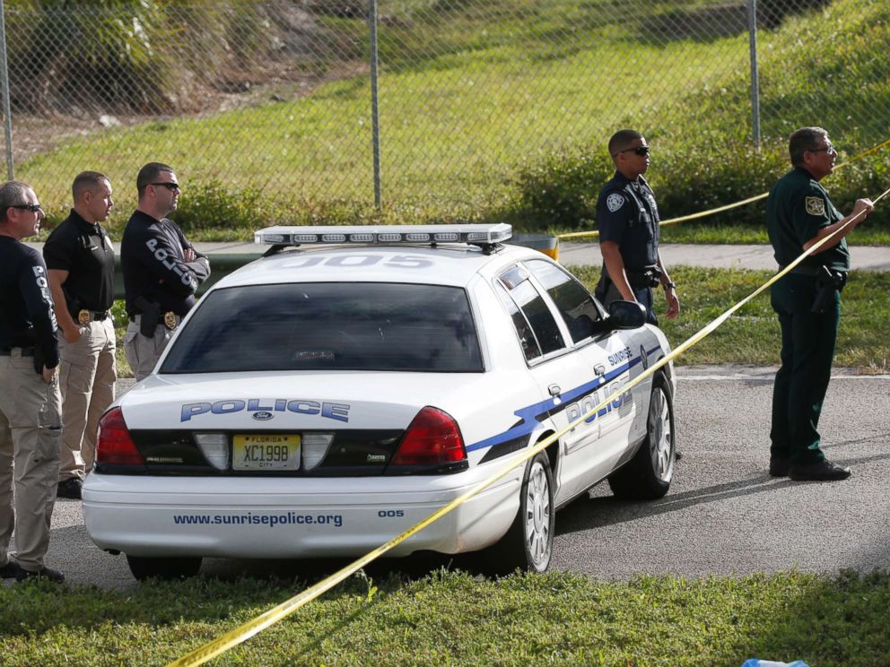 PHOTO: Law enforcement officers block off the entrance to Marjory Stoneman Douglas High School, Feb. 15, 2018 in Parkland, Fla.