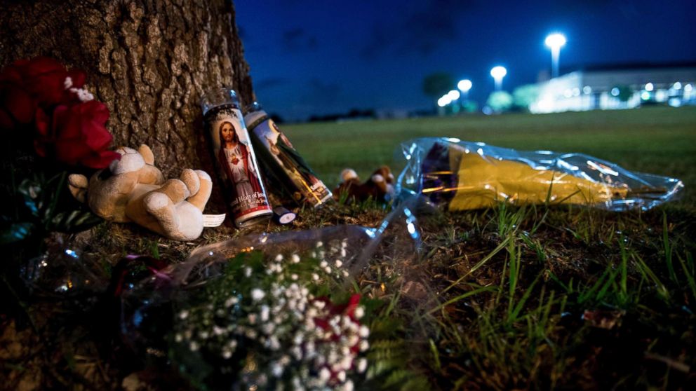 PHOTO: A makeshift memorial is seen outside Santa Fe High School a day after a mass shooting May 19, 2018 in Santa Fe, Texas.