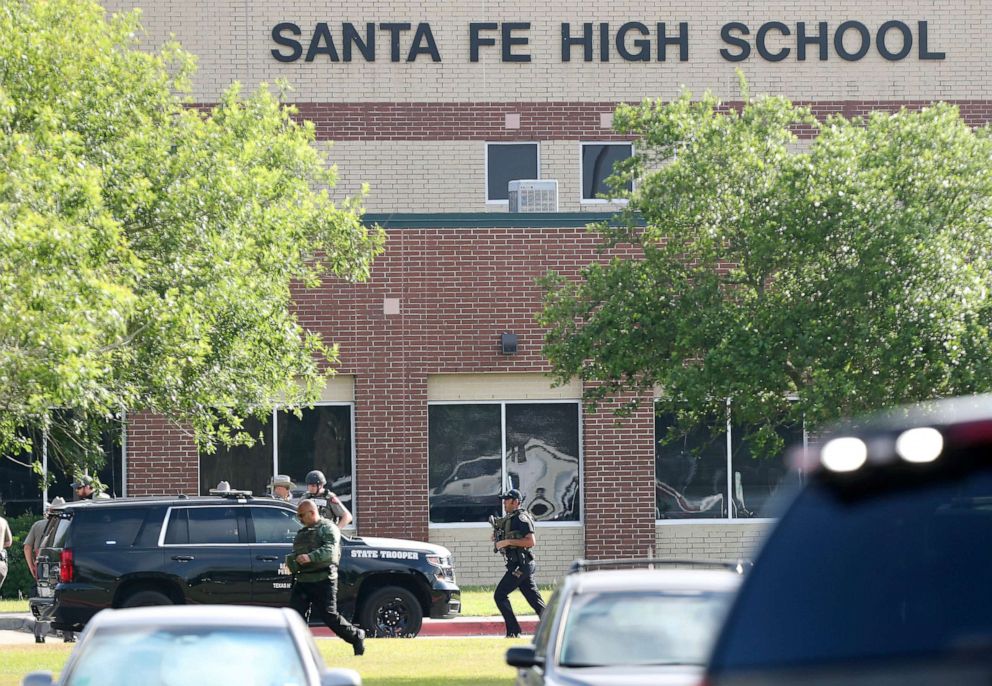 Law enforcement officers respond to Santa Fe High School after an active shooter was reported on campus, May 18, 2018, in Santa Fe, Texas.