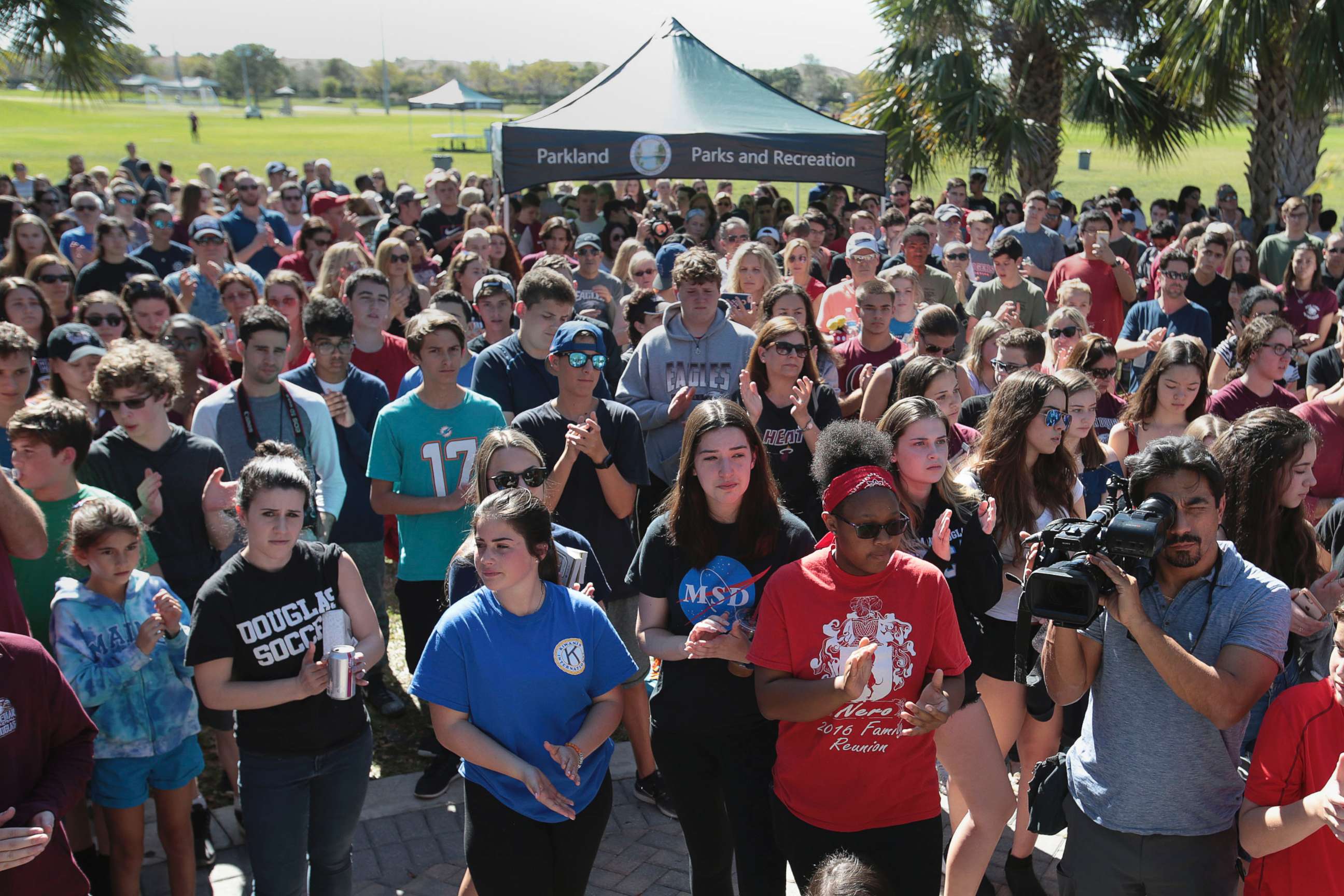 PHOTO: Students and parents arrive for a vigil at the Pines Trail Center, Feb. 15, 2018, in Parkland, Fla., for victims of the Parkland school shooting. 