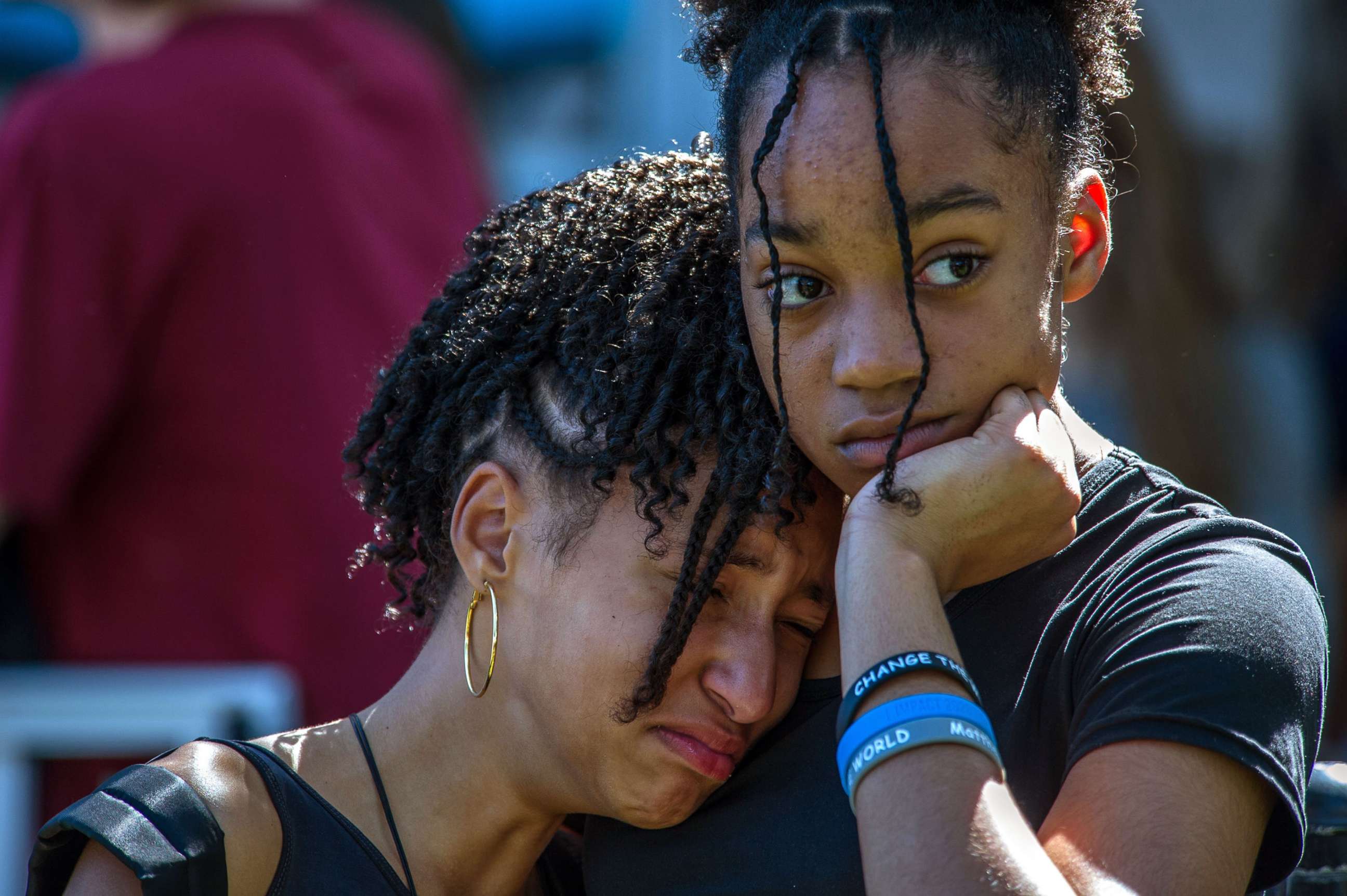PHOTO: From left, Jalina Kohen and Brianna Hall join hundreds of community members at a prayer vigil at Parkridge Church, in Parkland, Fla., Feb. 15, 2018. 
