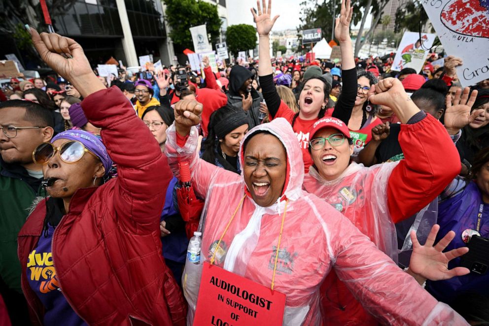PHOTO: Los Angeles public school support staff, teachers, rally outside of the school district headquarters on the first day of a three day strike, March 21, 2023 in Los Angeles.