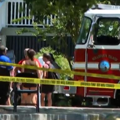 The suspect was found in a boat on the island following a manhunt, police said.