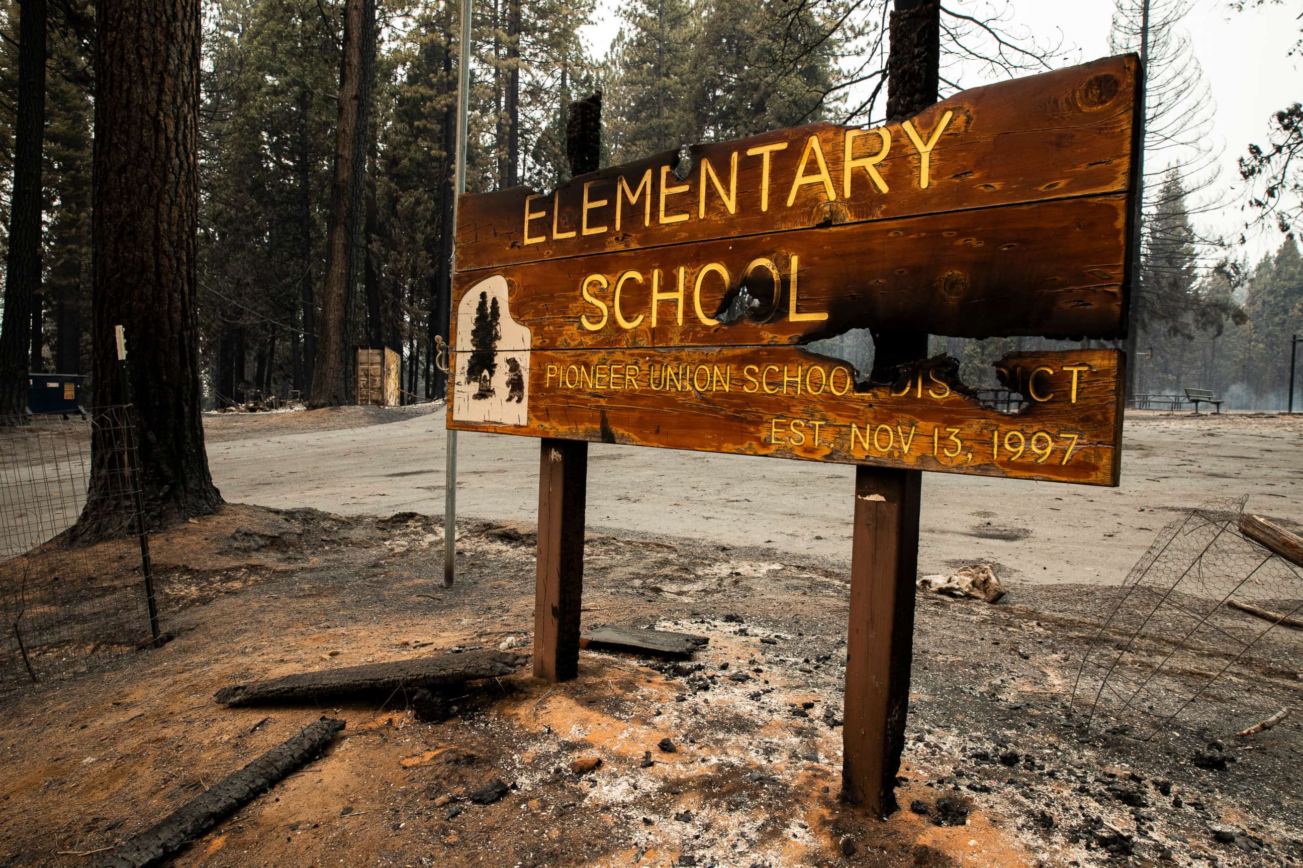 PHOTO: The burned sign to Walt Tyler Elementary School, is pictured on Aug. 18, 2021, in Grizzly Flats, Calif. The area was destroyed in the Caldor Fire.