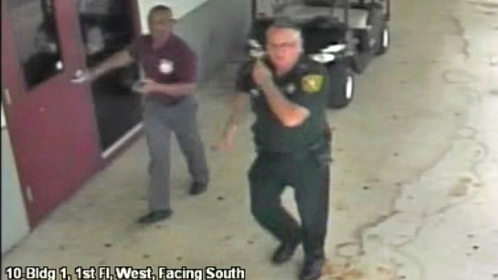 Then-Broward County Sheriff's Deputy Scot Peterson, who was assigned to Marjory Stoneman Douglas High School during the Feb. 14, 2018 shooting, is seen in this still image captured from the school surveillance video released by Broward County Sheriff's Office.