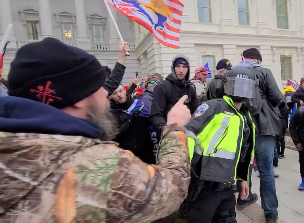 PHOTO: Scott Fairlamb of Sussex County, N.J., wearing a camouflage jacket, was caught on video shoving and hitting police outside of the U.S. Capitol in Washington on Jan. 6, 2021.